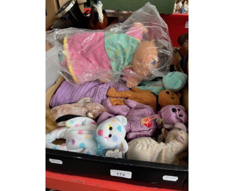 A box containing a cabbage patch play along doll (2004) and beanie bears. 