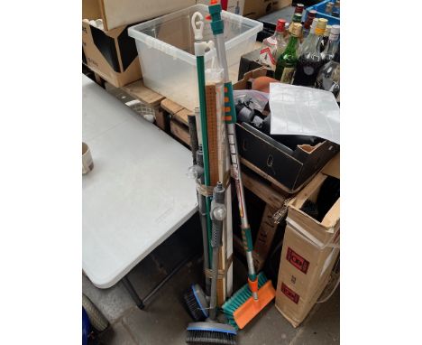 A bundle of hose brush attachments, roller blind, metal clothes prop, wooden metre rule 