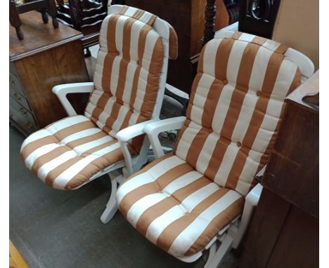 Two garden lounger chairs.