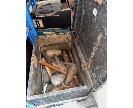 A wooden tool box and tools. 