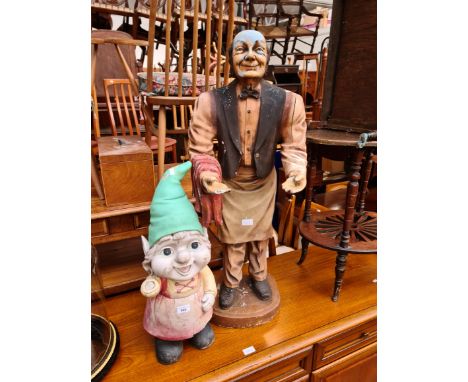 A garden gnome and a dumb waiter. 