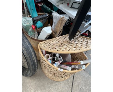 A tub of mixed garden tools including strimmer, sprayer, hose, and a tub of film posters 