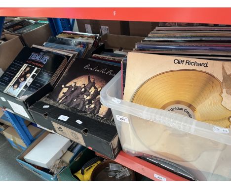 Three boxes containing over 200 records including The Tremoloes, Band on the Run, Elvis Presley, The Jacksons etc. 