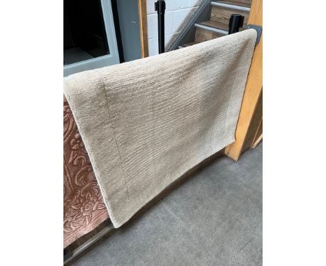 A John Lewis hand made wool carpet, cream ground, length 172cm. 