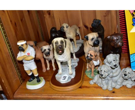 A COLLECTION OF BULL MASTIFF DOG FIGURINES, comprising a bronzed effect figure of a girl reading to her dog, three Naturecraf