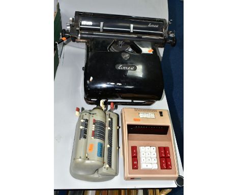 OFFICE EQUIPMENT, an Everest model ST manual typewriter, made in Italy, a Lago Calc. Inc. electronic calculator and Muldivo M