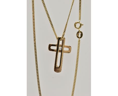 A 9CT GOLD DIAMOND SET CROSS PENDANT AND CHAIN, the openwork cross pendant set with a single round brilliant cut diamond to t