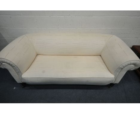 AN 19TH CENTURY CREAM UPHOLSTERED CHESTERFIELD SOFA, on square tapered legs, and ceramic casters, length 206cm x depth 90cm x