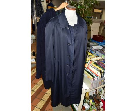 A GENTLEMAN'S  CLASSIC BURBERRY RAINCOAT, in navy blue, signature check lining with a detachable 100%  wool signature check l