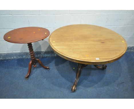 A VICTORIAN WALNUT CIRCULAR BREAKFAST TABLE, diameter 103cm x height 69cm, and a Victorian oval tripod table (condition:-some