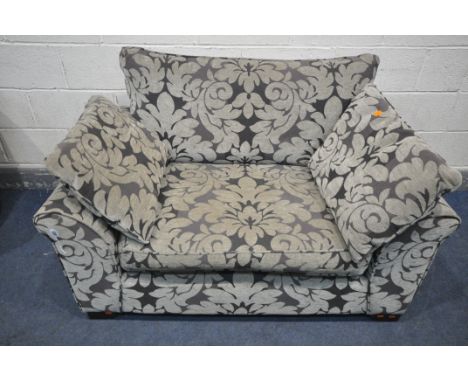 A FLORAL UPHOLSTERED LOVE SOFA, length 138cm (condition:-slightly discoloured)