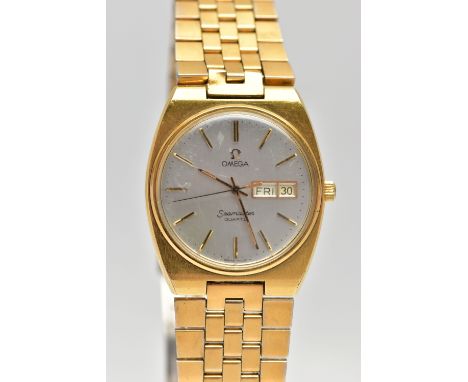 A GOLD PLATED 'OMEGA SEAMASTER QUARTZ' WRISTWATCH, round silver dial signed 'Omega Seamaster quartz', baton markers, day/date