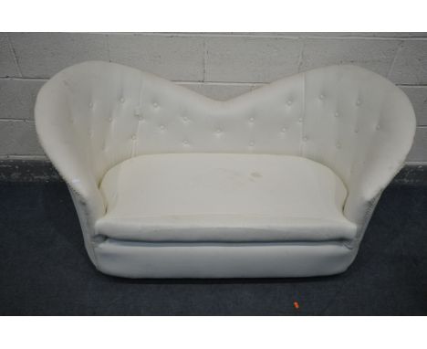 A BUTTONED TWIN SPOON BACK SOFA, upholstered in a white fabric, length 147cm (condition - ideal for restoration due to the so