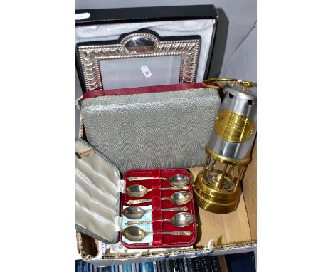 A BOX OF SILVER PLATED ITEMS AND A MINER'S LAMP, to include a 'British Coalmining Company, Wales, UK' brass and other metal m