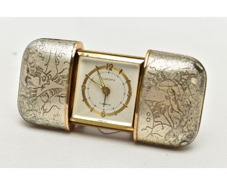 A 'EUROPA' TRAVEL CLOCK, early 20th century 'Europa' travel clock, a hand wound 7 jewelled movement with a mechanical alarm, 