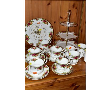 A ROYAL ALBERT 'OLD COUNTRY ROSES' PATTERN PART TEA SET,  comprising a three tier cake stand (bottom plate cracked), a wall c