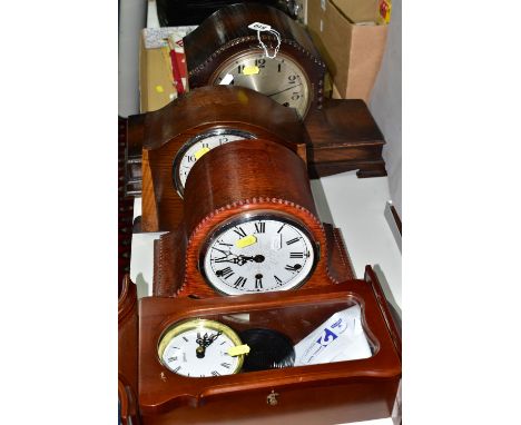 THREE WOODEN MANTEL CLOCKS AND A WOODEN CASED WALL CLOCK, comprising a 1920s Westminster chimes mantel clock with key and pen