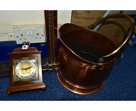 A MAPPIN &amp; WEBB  MANTEL CLOCK TOGETHER WITH A 20TH CENTURY COPPER FENDER, and a copper and brass coal scuttle, the copper