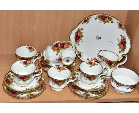 A TWENTY ONE PIECE ROYAL ALBERT OLD COUNTRY ROSES PART TEA SET, comprising a cream jug, a sugar bowl, a cake plate, six tea p