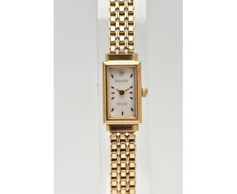 A 9CT GOLD 'ACCURIST' WRISTWATCH, quartz movement, rectangular mother of pearl dial, signed 'Accurist Gold' baton markers, di