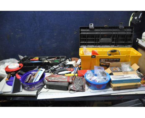 A PLASTIC TOOLBOX AND A BAG CONTAINING TOOLS, including an RS voltage tester, multimeter, a Stanley Yankee, a BA tap and Die 