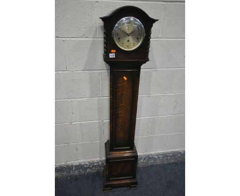 A 20TH CENTURY OAK CHIMING GRANDDAUGHTER CLOCK, height 148cm, with pendulum (condition:-good condition)