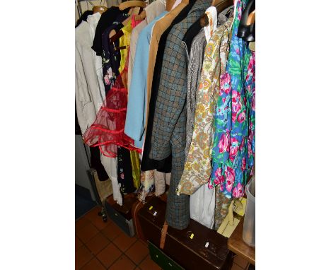 A GROUP OF VINTAGE CLOTHING, to include a dark brown fur coat, a 1960s pale blue Crimpolene suit, a 1970s floral print maxi d