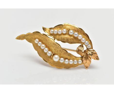AN 18CT YELLOW GOLD CULTURED PEARL BROOCH, in the form of two leaves, each stain finish leaf is set with a row of graduated c