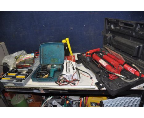 A SELECTION OF AUTOMOTIVE TOOLS, including a cased Sealey RE97/10.v3 10 tonne Hydraulic Body Repair Kit, a 110v Makita Impact