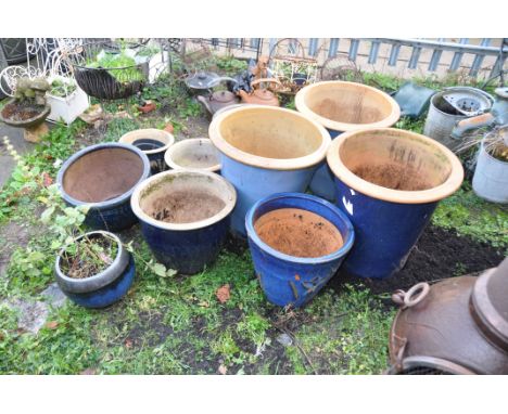 TEN BLUE GLAZED PLANT POTS including a pair in light blue 48cm in diameter and 49cm high (Condition to all good apart from on