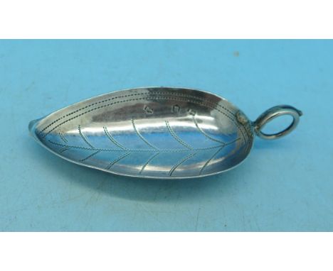 A small Georgian silver caddy spoon