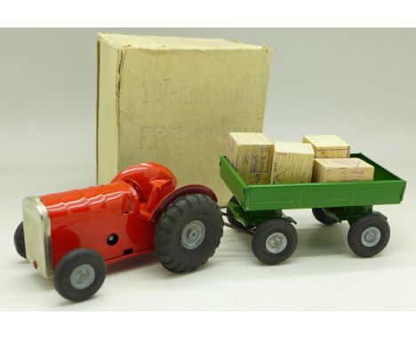 A Tri-ang Minic Toys Farm Tractor and Trailer, boxed