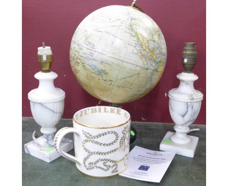 A terrestrial globe, a Wedgwood Queen Elizabeth II Golden Jubilee mug and a pair of alabaster table lamp bases