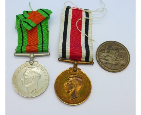 A Special Constabulary medal, a WWII medal and a Mercantile Marine medal a/f, the Police medal awarded to Esme C.R. Keir, (Fe