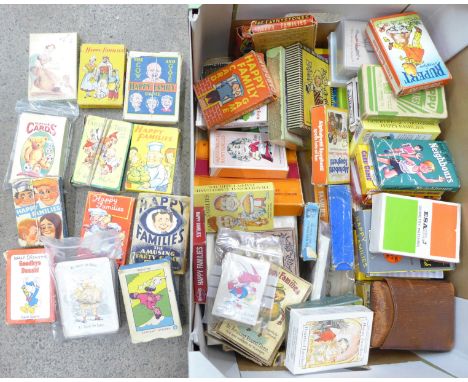A box of vintage playing cards; Happy Families, other children's card games, etc., 50 packs approximately