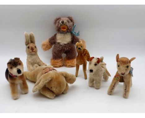 Steiff, Konvolut Tiere und Teddybär, u.a. 2 Hunde, Bambi, 2 Hasen, Zicky und Teddybär,1950/60er Jahre, Spielspuren