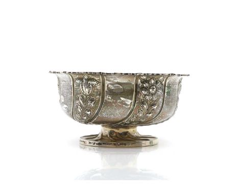 A silver rose bowl, by Nathan &amp; Hayes, Chester, 1897, with a shaped rim and with embossed spiral and floral panels, crest