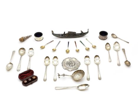 A collection of silver items to include a Chinese filagree boat, 20cm wide, a Hanau dish, embossed with figures in a garden, 