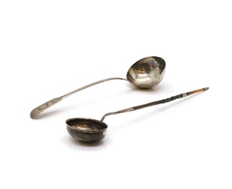 A Georgian fiddle pattern silver ladle, by Solomon Royes, London, 1820, monogrammed 'EW', 32cm long;and a silver toddy ladle,