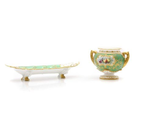 A Royal Worcester porcelain twin handled squat form vase c.1903, enamelled with fruit in gilt border reserve against green gr