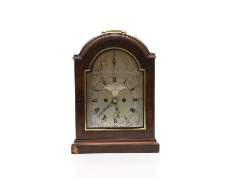 A George III mahogany bracket clock by William Elliott of London, with a silvered dial, the broken arch dial with a 'strike/s