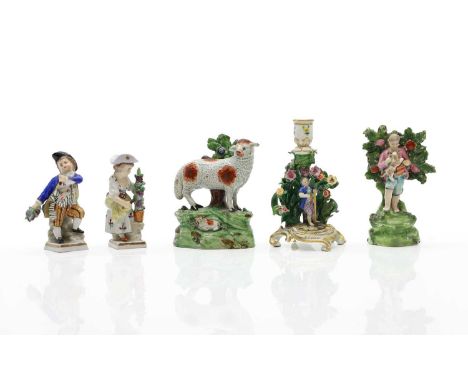 A Staffordshire pearlware figure  19th century, of a ewe and lamb, on a knoll with bocage, 13.cm high,together with a similar