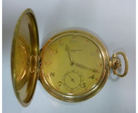 A Ch.F.Tissot et Fils, Locle gold coloured metal slim cased, full hunter pocket watch with engine turned decoration, the keyl