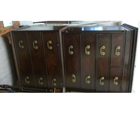 A late Victorian mahogany chest-on-chest, the upper part having a dentil moulded cornice, over two short and three long drawe
