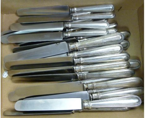 An incomplete set of Continental silver coloured metal flatware and cutlery with bead bordered decoration  stamped 800