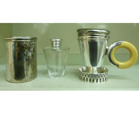 An early Victorian traveller's silver toddy cup, comprising a cylindrical sleeve, enclosing a removable conical shaped liner 