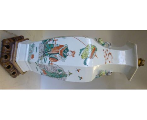 A late 19thC Chinese porcelain vase of panelled, hexagonal baluster form, decorated with applied, moulded fruit, figures and 