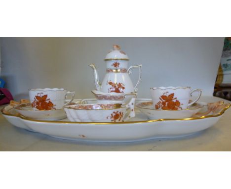 A Herend ivory porcelain glazed and moulded basketweave cabaret set, decorated in gilded iron red with floral sprigs and foli