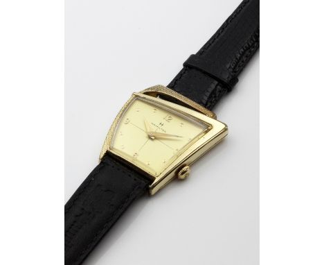 Herrenarmbanduhr "HAMILTON FLIGHT".Mehrpassig asymmetrisches 10 kt. gold filled Gehäuse, mattgoldenes Zifferblatt mit goldene