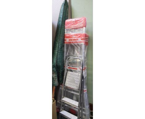 A "Henchman" tripod step ladder with a pair of used folding steps